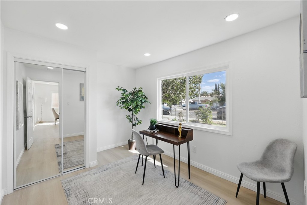 9431 Cypress Avenue Riverside, CA 92503 - Photo 24 of 40 a workspace room with furniture and a potted plant