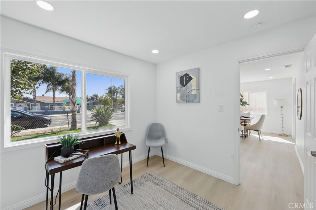 9431 Cypress Avenue Riverside, CA 92503 - Photo 25 of 40 a workspace with furniture and a potted plant