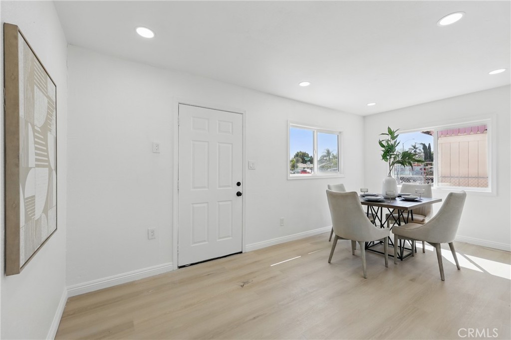 9431 Cypress Avenue Riverside, CA 92503 - Photo 7 of 40 a dining room with furniture and window
