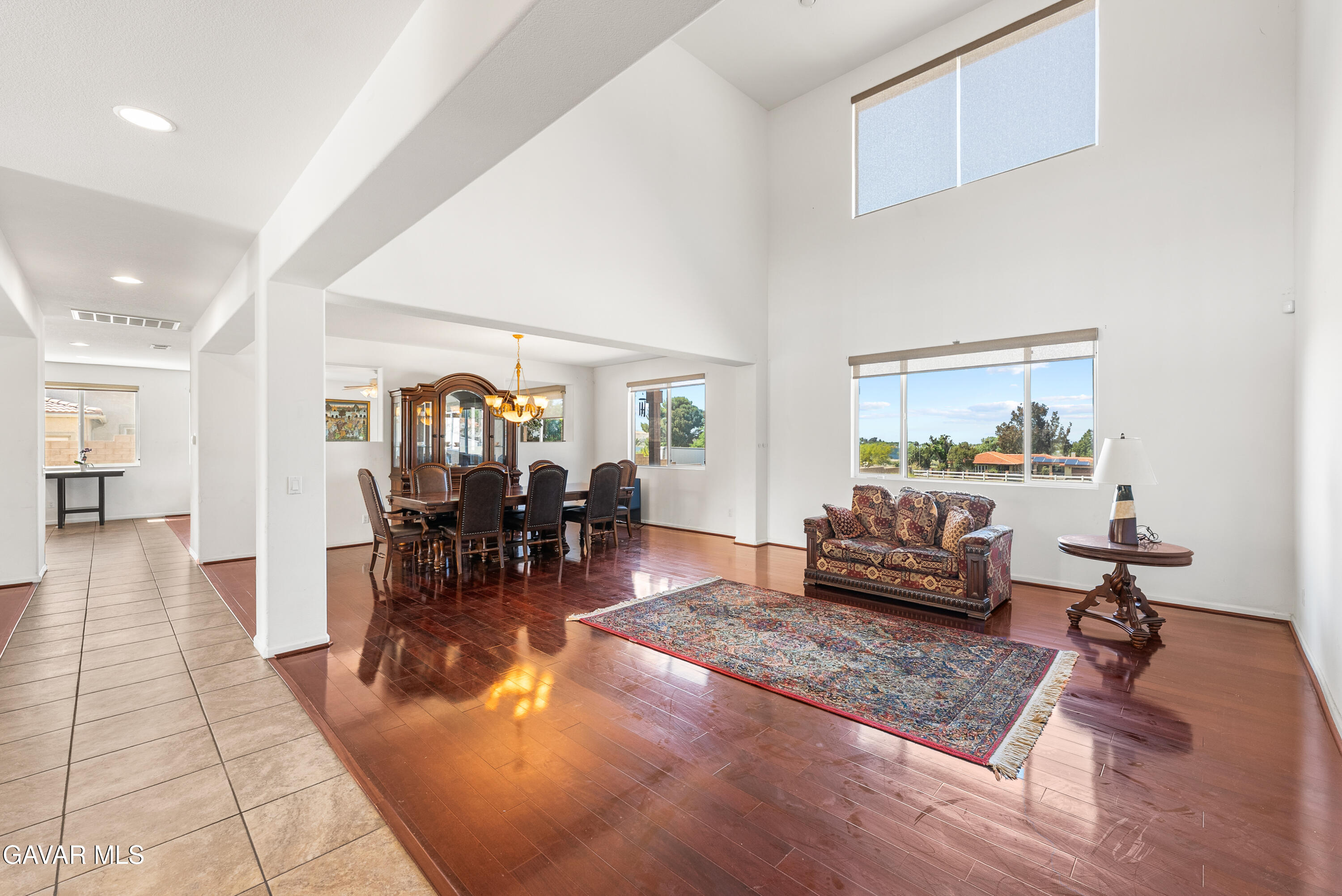 658 Lago Lindo Road Palmdale, CA 93550 - Photo 12 of 91 a living room with furniture and wooden floor