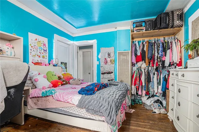 a bedroom with furniture and a bed