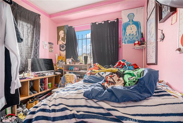 a room with furniture and a flat screen tv