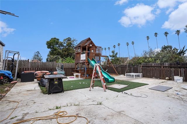 a view of house with outdoor space