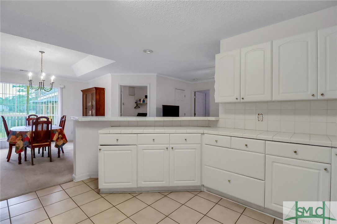 6 Hiram Road Bloomingdale, GA 31302 - Photo 15 of 45 Kitchen to dining area
