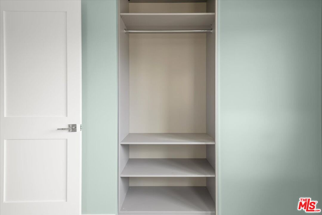 1317 Punta Gorda Street, Unit 3 Santa Barbara, CA 93103 - Photo 23 of 70 a view of walk in closet with empty racks