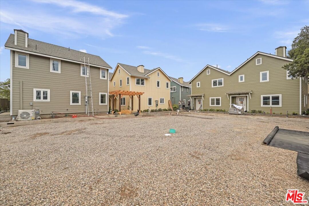 1317 Punta Gorda Street, Unit 3 Santa Barbara, CA 93103 - Photo 33 of 70 a front view of a house with a yard