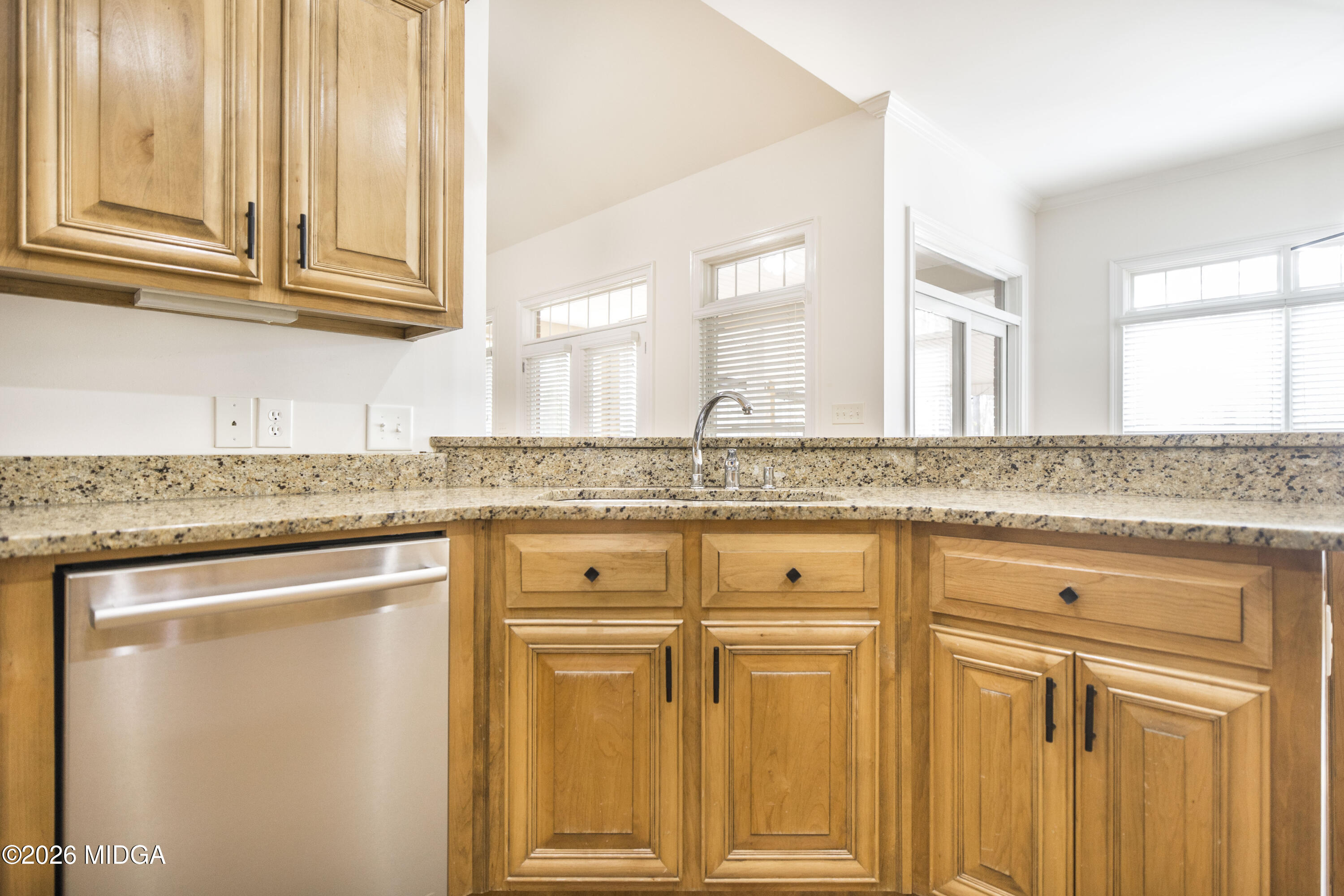 720 Latrobe Way Macon, GA 31220 - Photo 21 of 52 a view of a kitchen with granite countertop cabinets and a sink