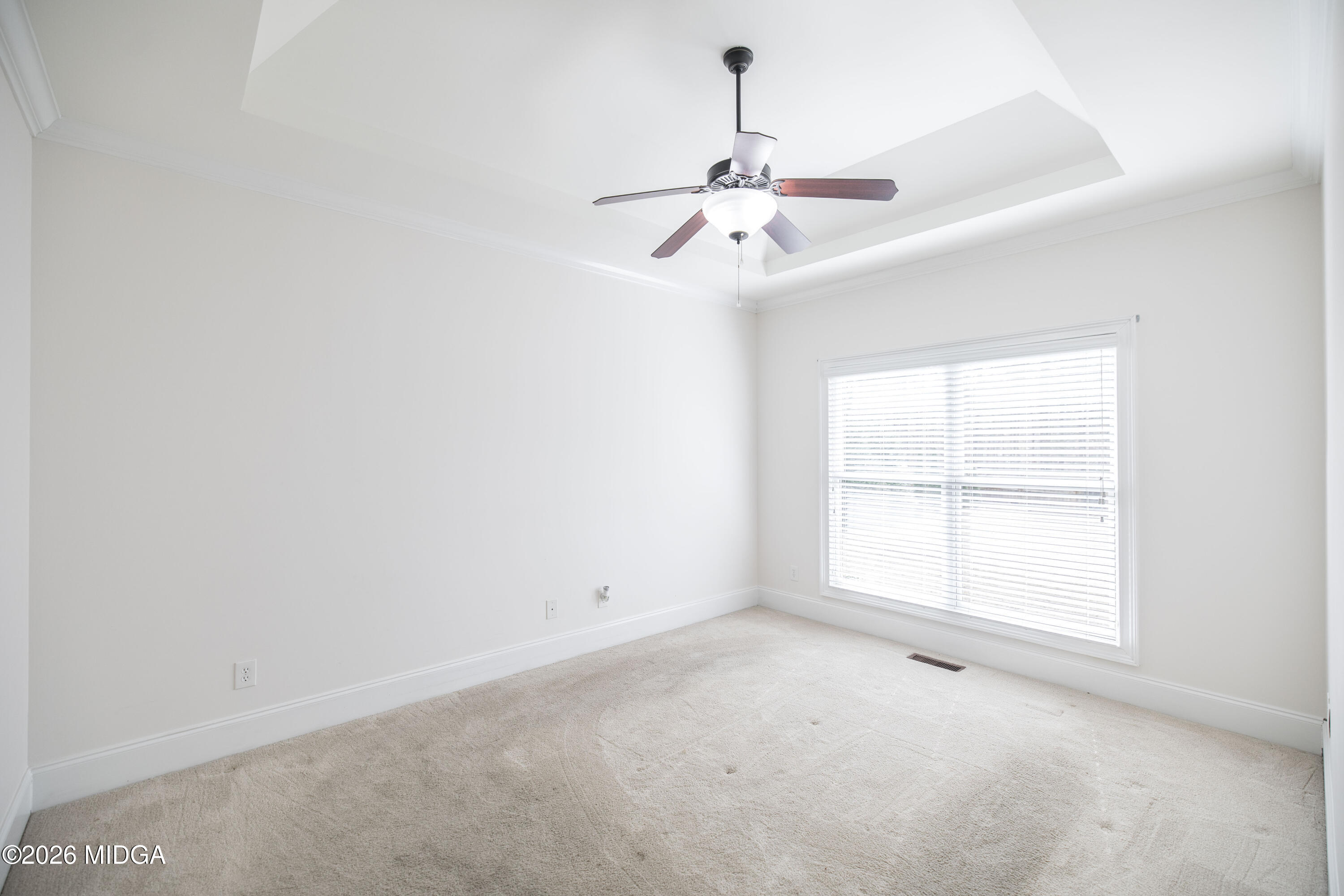 720 Latrobe Way Macon, GA 31220 - Photo 26 of 52 an empty room with windows and fan