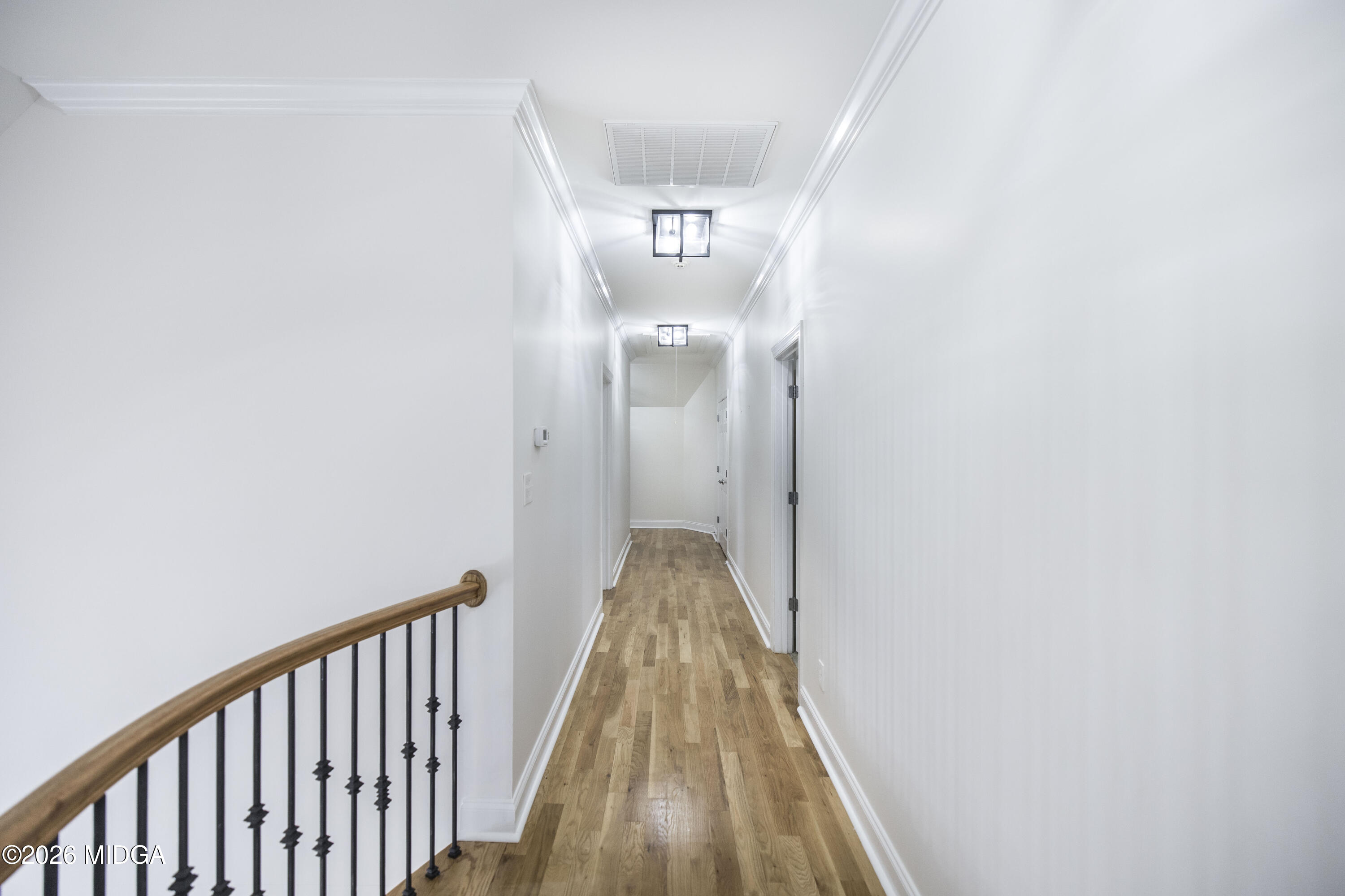 720 Latrobe Way Macon, GA 31220 - Photo 38 of 52 a view of a hallway with wooden floor