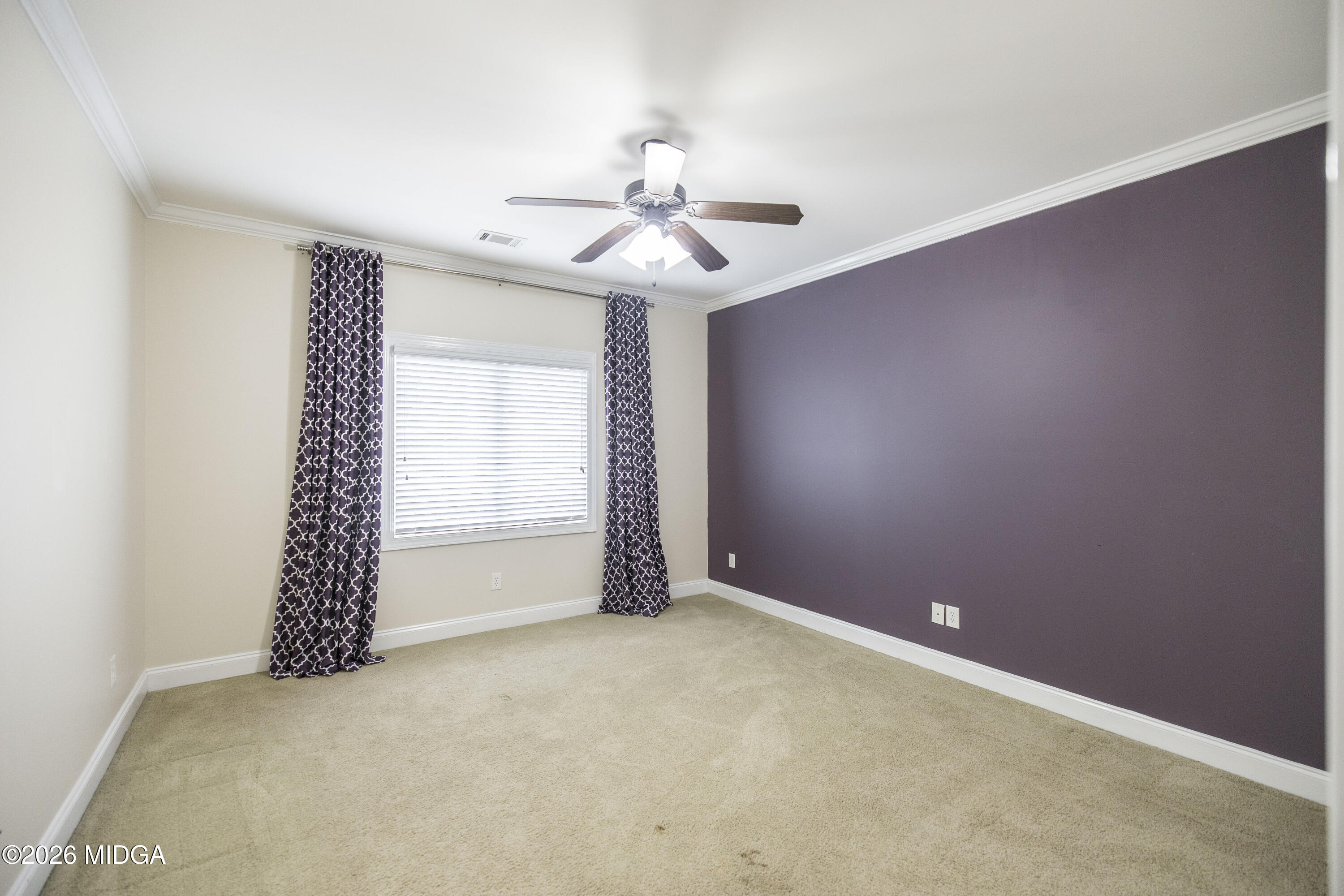 720 Latrobe Way Macon, GA 31220 - Photo 39 of 52 an empty room with windows and fan