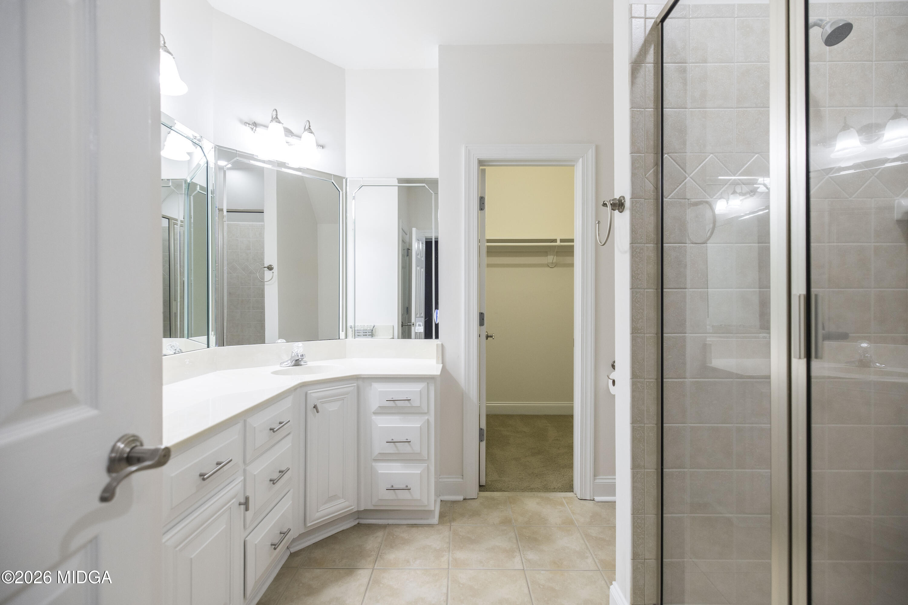 720 Latrobe Way Macon, GA 31220 - Photo 41 of 52 a spacious bathroom with a double vanity sink mirror and double