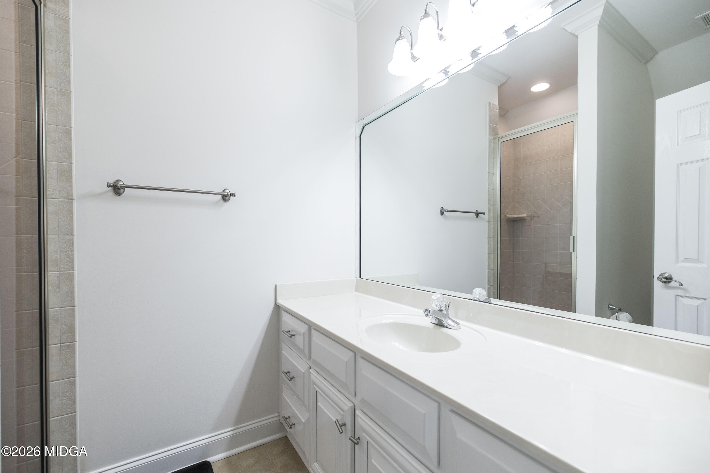 720 Latrobe Way Macon, GA 31220 - Photo 45 of 52 a bathroom with a sink and a mirror