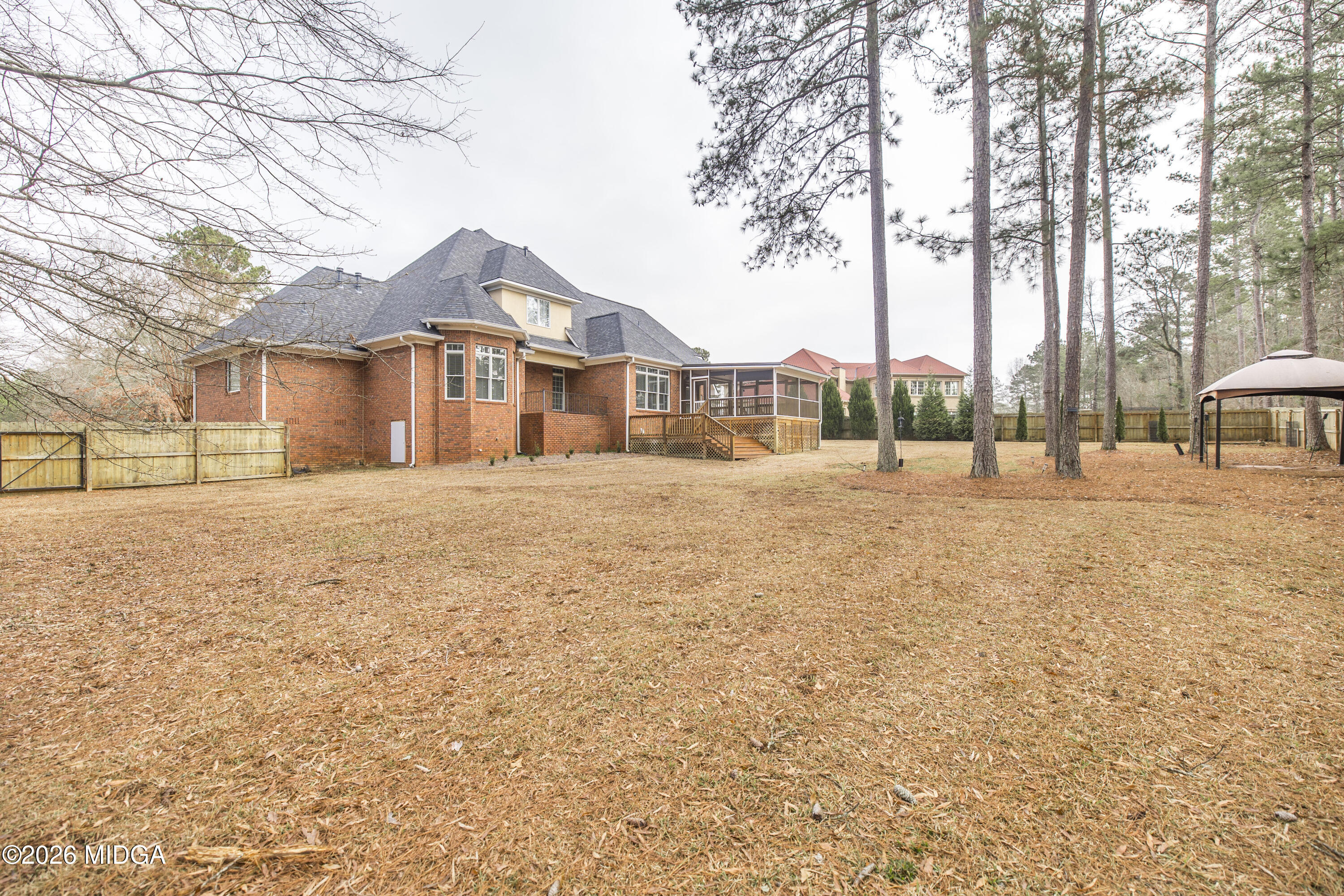 720 Latrobe Way Macon, GA 31220 - Photo 51 of 52 a front view of a house with a yard covered with snow
