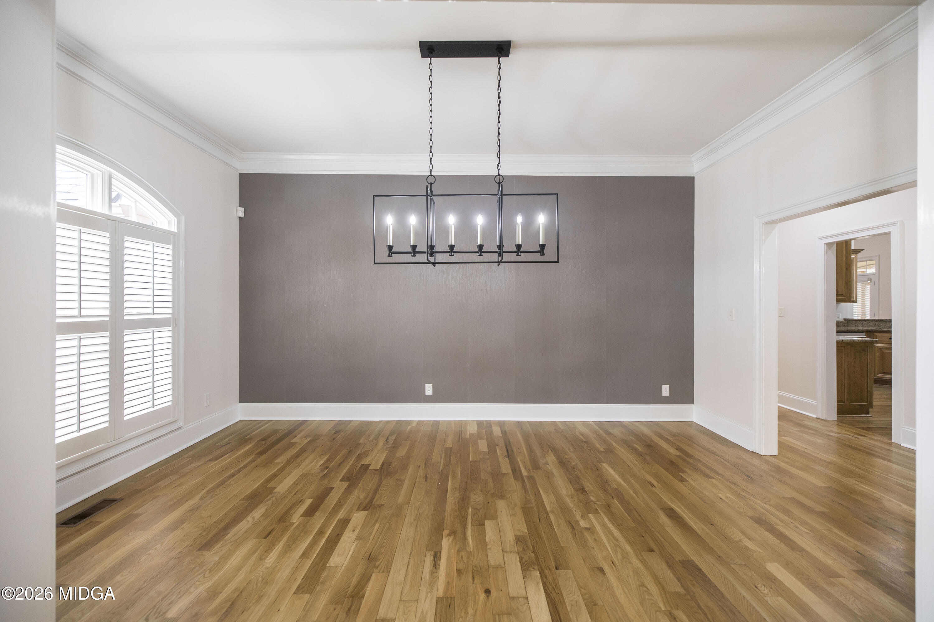 720 Latrobe Way Macon, GA 31220 - Photo 10 of 52 a view of empty room with wooden floor and fan