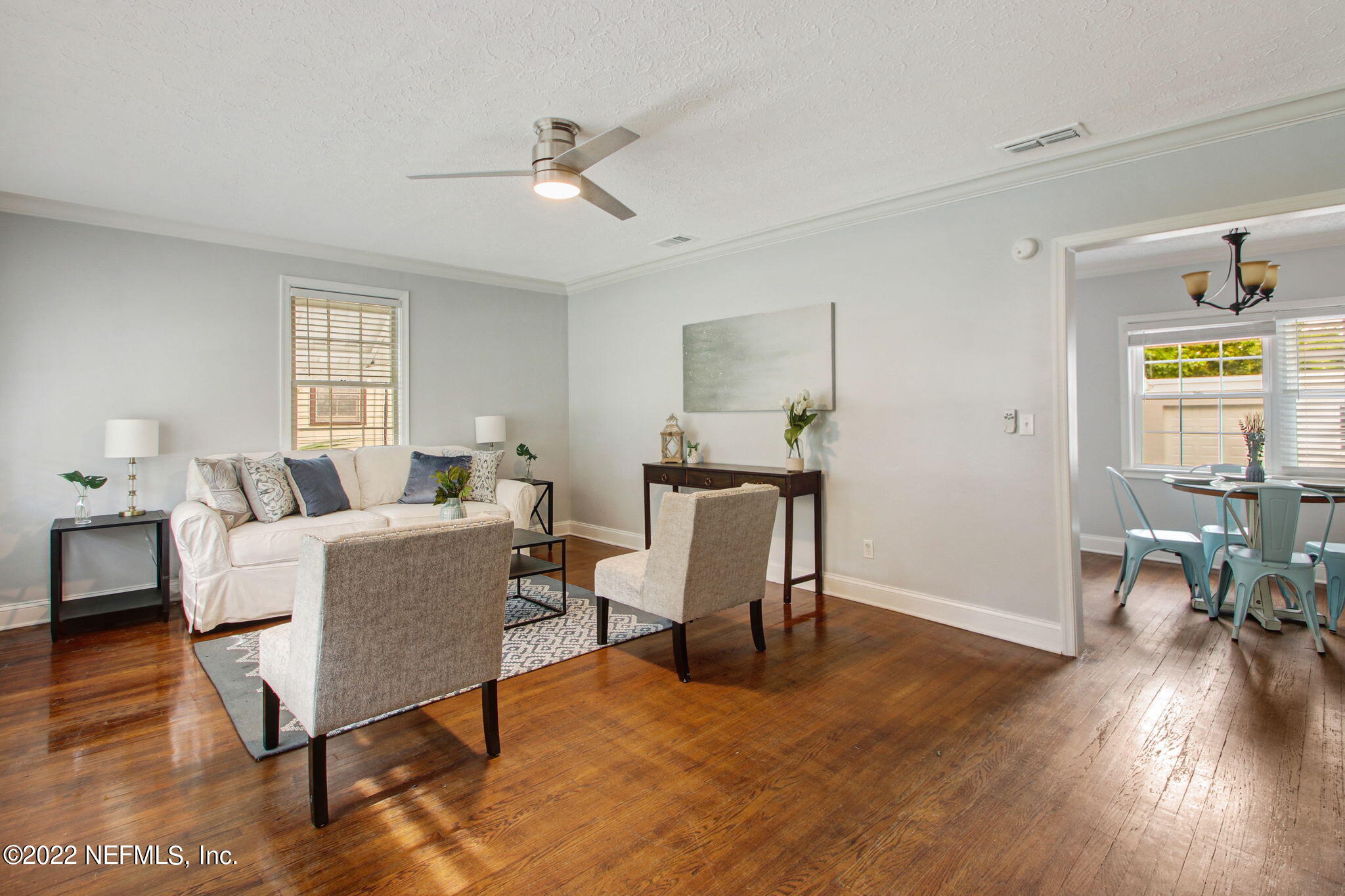1743 Planters Road Jacksonville, FL 32207 - Photo 5 of 29 a living room with furniture and a wooden floor