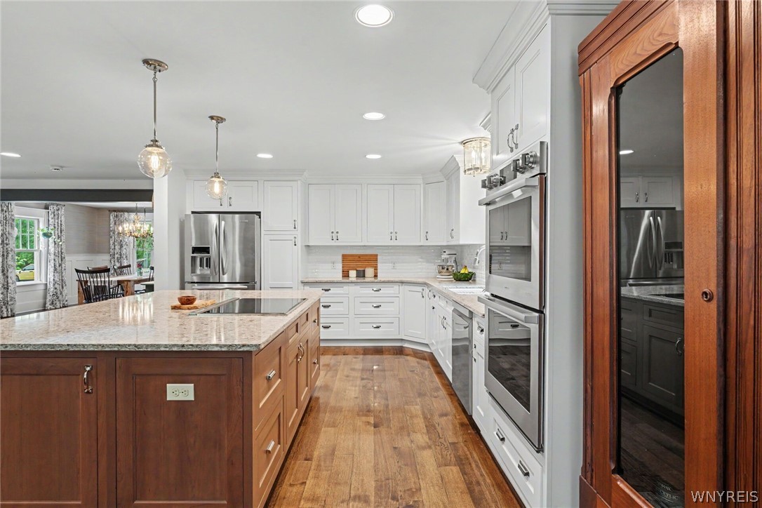 6600 Dye Road Newstead, NY 14001 - Photo 24 of 50 Side view of kitchen w/ beautiful appliances