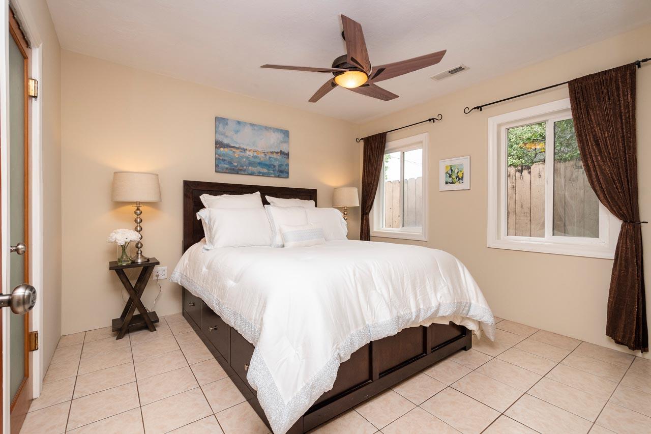 381 Old County Road San Carlos, CA 94070 - Photo 12 of 23 a bedroom with a bed and a window