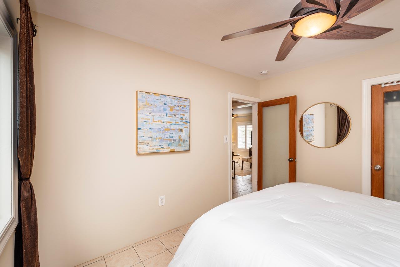 381 Old County Road San Carlos, CA 94070 - Photo 13 of 23 a bedroom with a bed and a window