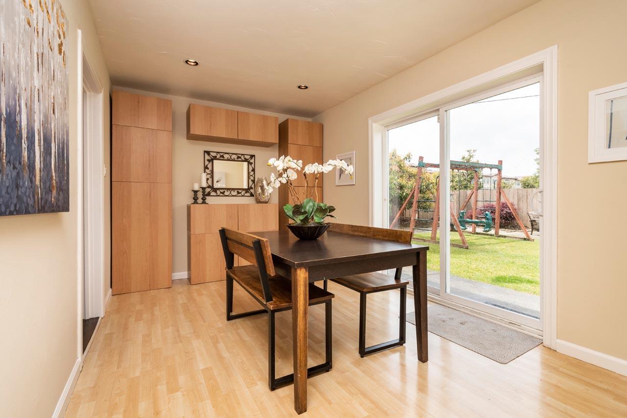 381 Old County Road San Carlos, CA 94070 - Photo 17 of 23 a view of a dining room with furniture window and wooden floor