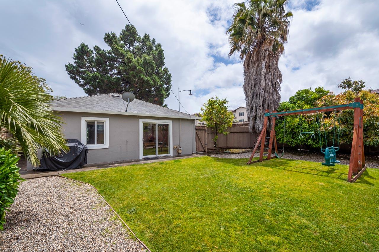 381 Old County Road San Carlos, CA 94070 - Photo 23 of 23 a view of a house with a yard and a tree