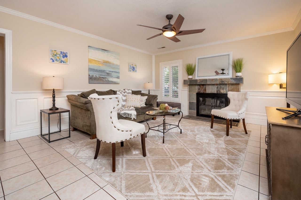 381 Old County Road San Carlos, CA 94070 - Photo 7 of 23 a living room with furniture a fireplace and a window