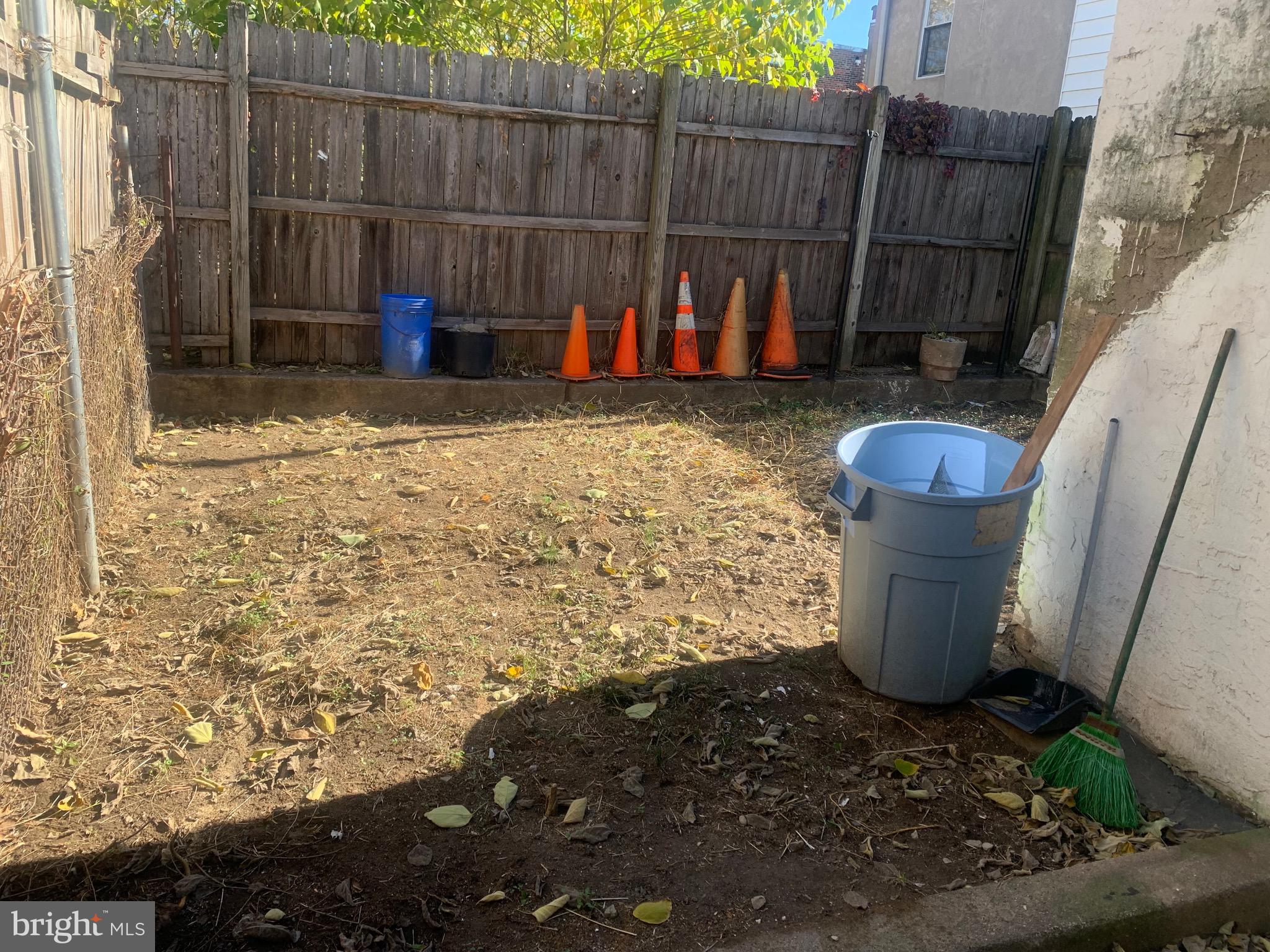 2387 Orthodox Street Philadelphia, PA 19137 - Photo 12 of 13 a view of a backyard with wooden fence