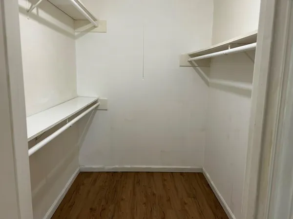 a view of small space with racks on the wall