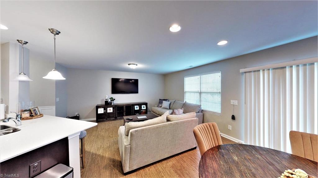 3885 Copperfield Court High Point, NC 27282 - Photo 11 of 30 Another view of the Dining, Great room and shows all the lighting in the area