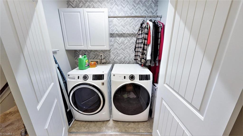 3885 Copperfield Court High Point, NC 27282 - Photo 19 of 30 Note that they have decorated Laundry Area with a place for you cleaning products and a place to hang the clothes as they come out of the dryer