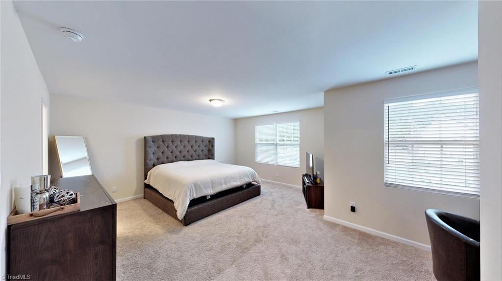 3885 Copperfield Court High Point, NC 27282 - Photo 20 of 30 Primary Bedroom is large with an offset for a sitting area