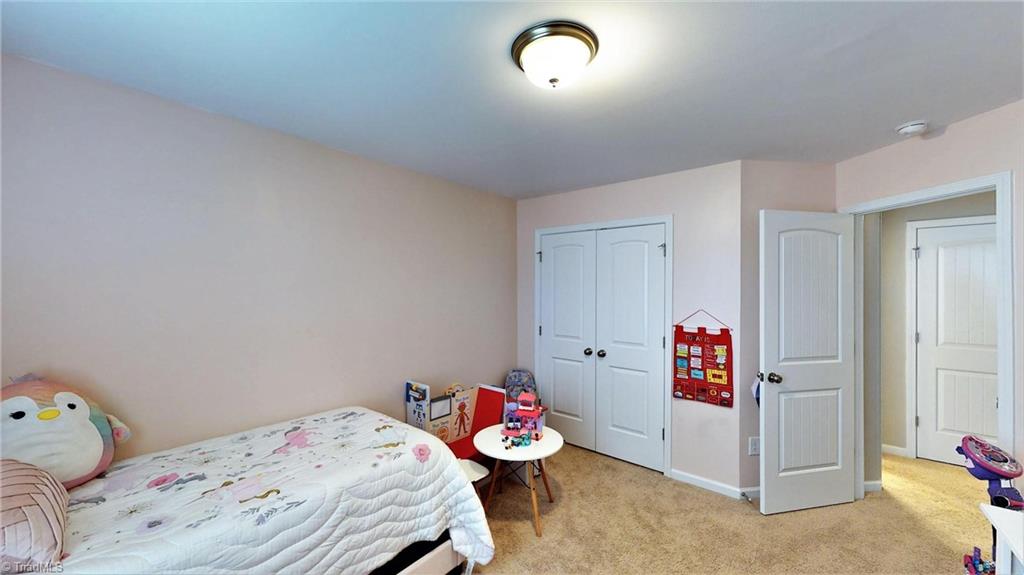 3885 Copperfield Court High Point, NC 27282 - Photo 25 of 30 3rd Bedroom also has double door closets