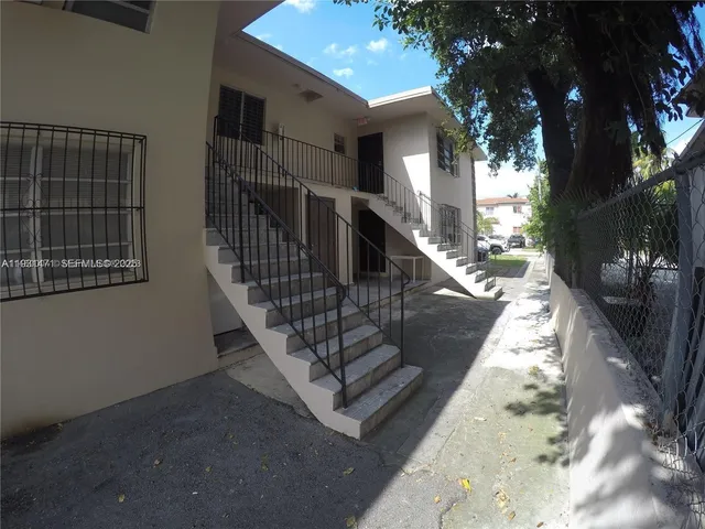 a view of a house with a patio