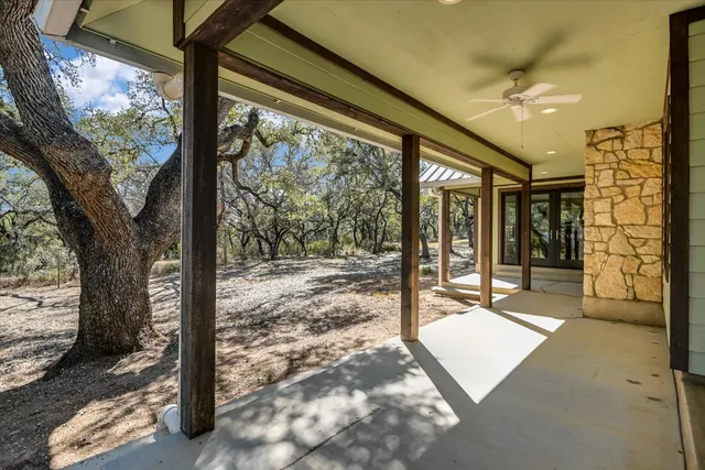a view of a porch with a backyard