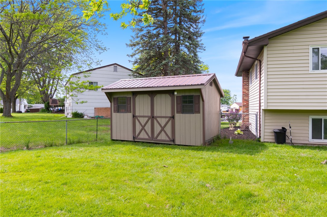 218 Kusak Road Henrietta, NY 14467 - Photo 7 of 33 New shed and fence.