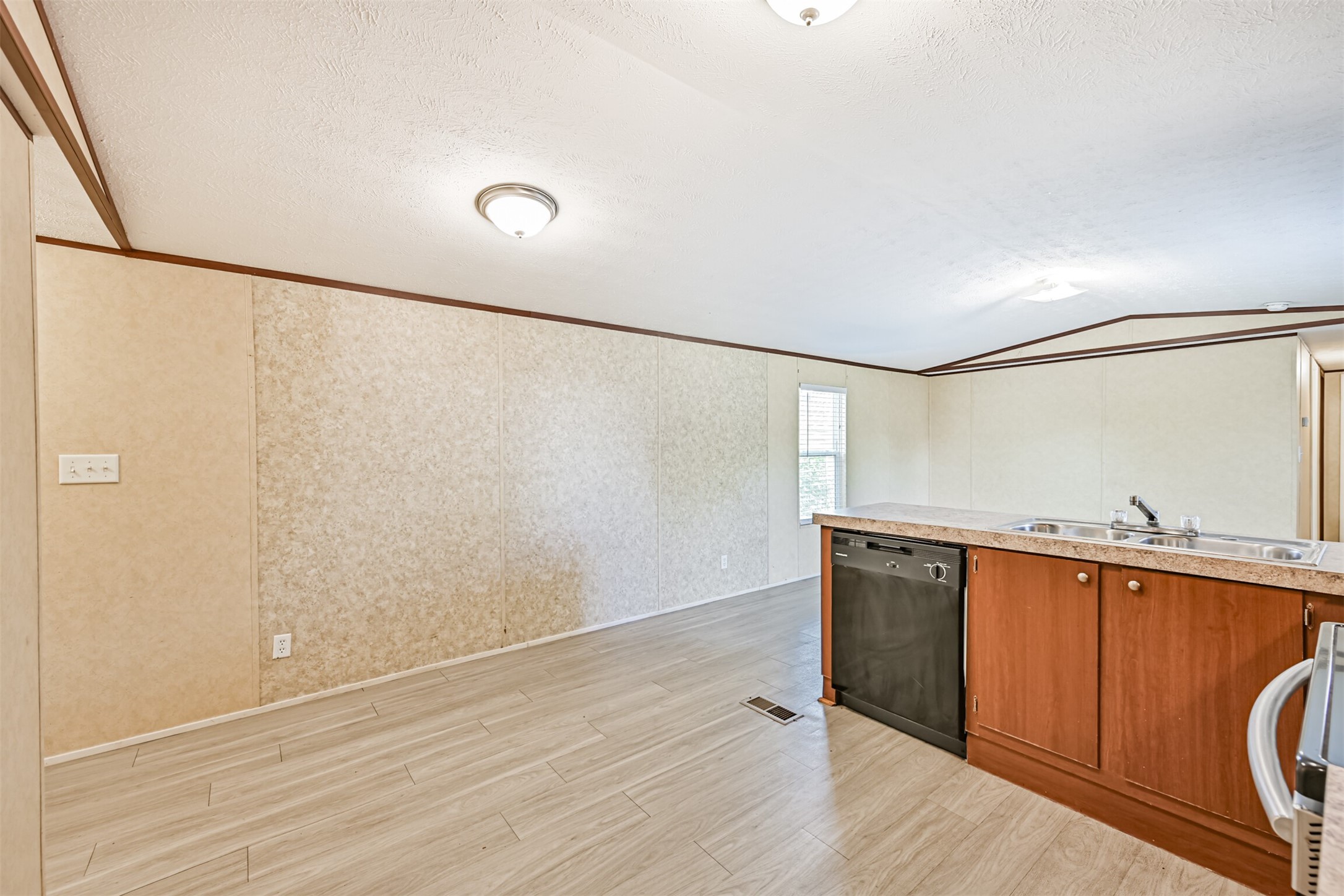4702 10th Street Bacliff, TX 77518 - Photo 15 of 33 a view of a hardwood floor in a room