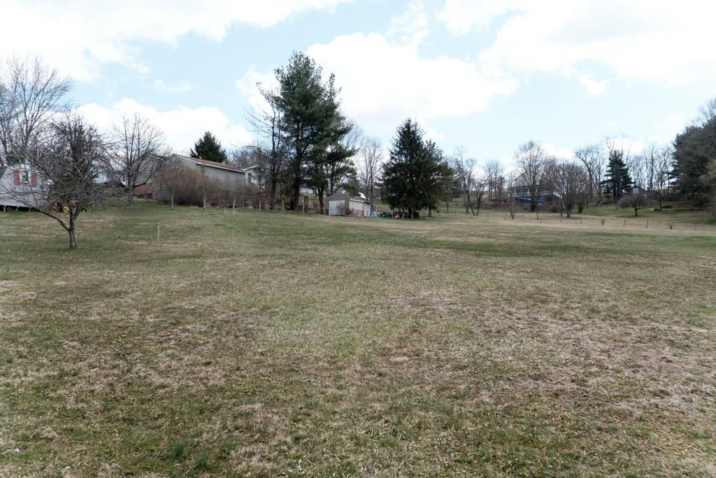 162 Patterson Road Finleyville, PA 15332 - Photo 22 of 25 View of back yard looking to the left side. The spitrail fence relatively define the property boundary