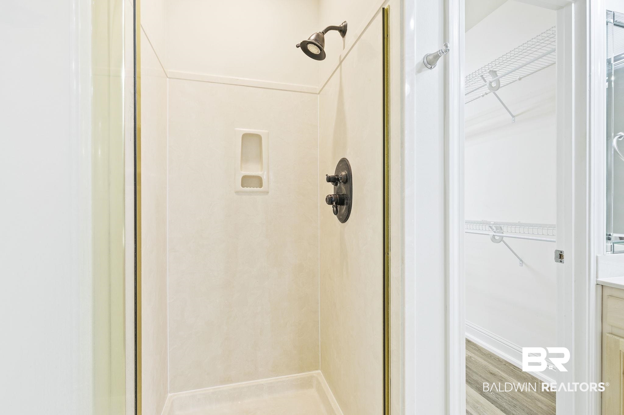 13 Bugle Retreat Daphne, AL 36527 - Photo 11 of 40 Bathroom featuring hardwood / wood-style floors and an enclosed shower