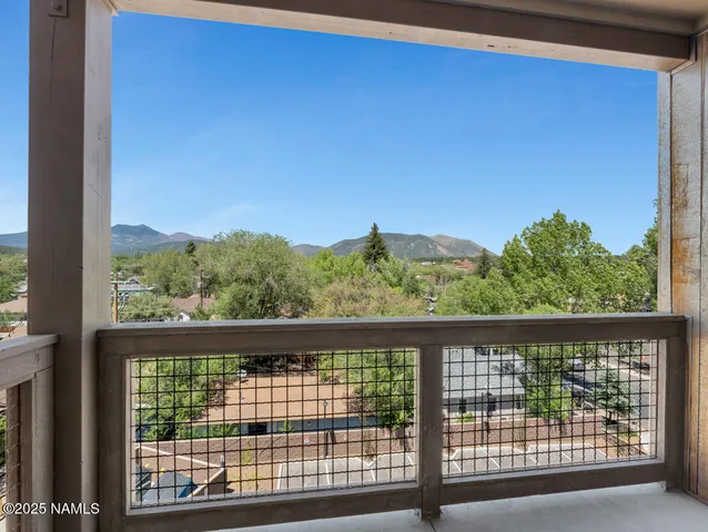 a view of a hallway with washer and dryer