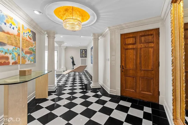 a view of a entryway door with a rug