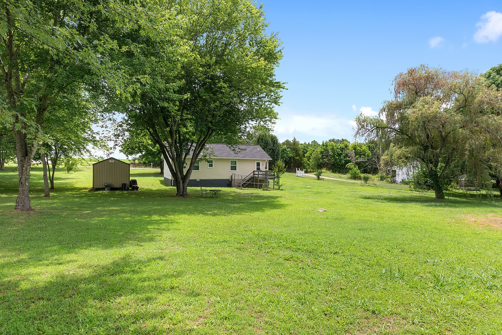 6614 Highway 49 Springfield, TN 37172 - Photo 18 of 19 a front view of a house with a yard and tree