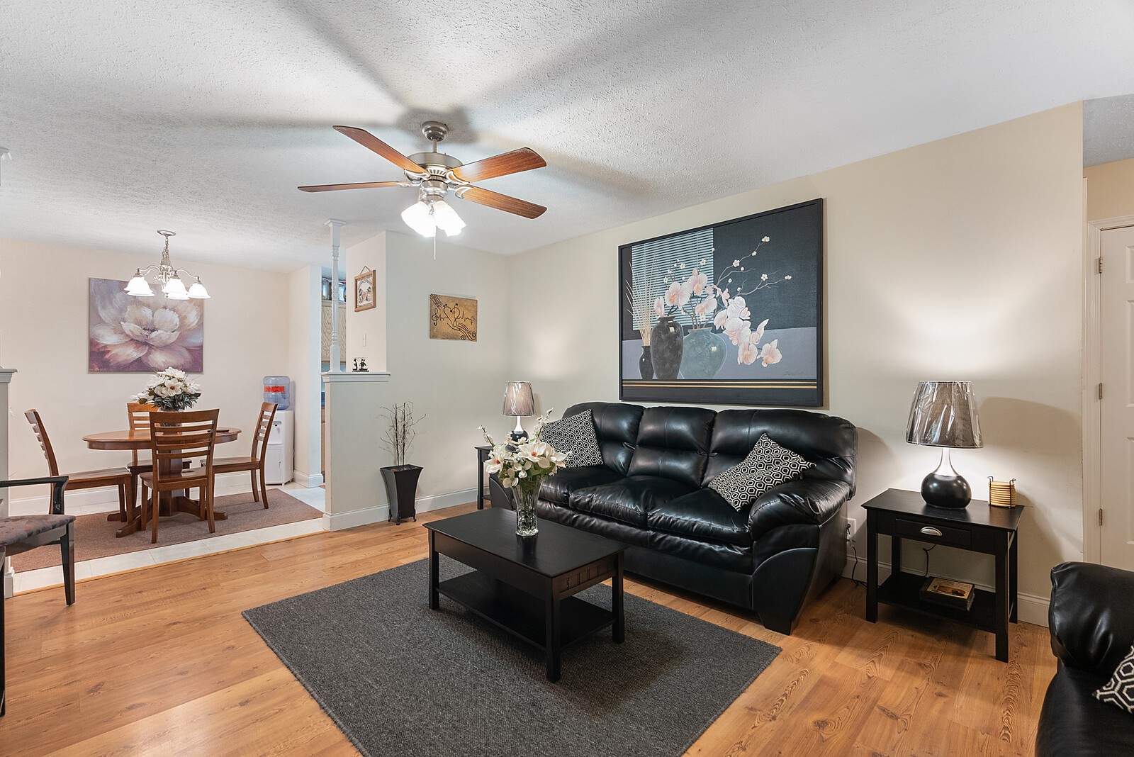 6614 Highway 49 Springfield, TN 37172 - Photo 6 of 19 a living room with furniture a table and wooden floor