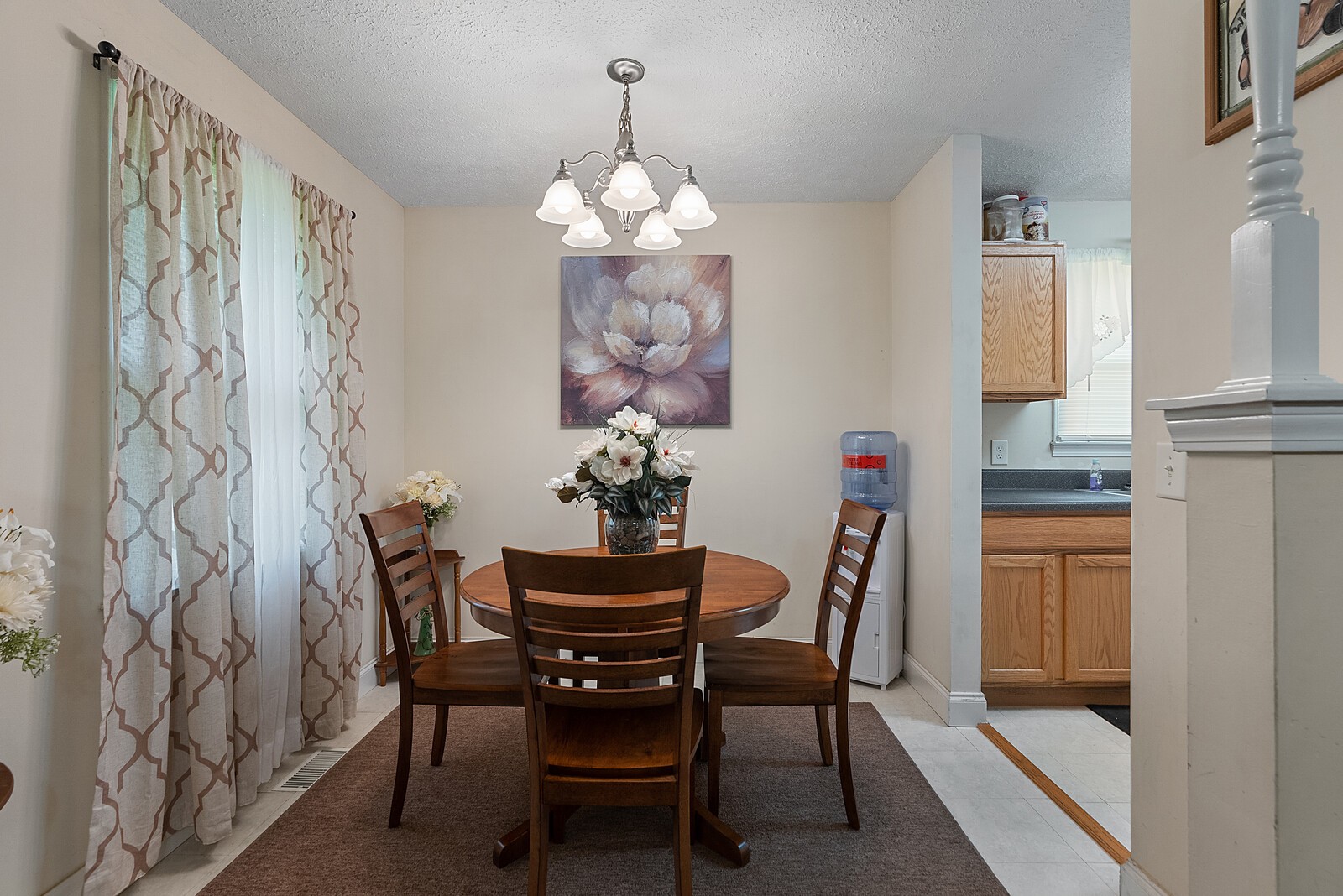 6614 Highway 49 Springfield, TN 37172 - Photo 7 of 19 a dining room with furniture a chandelier and wooden floor