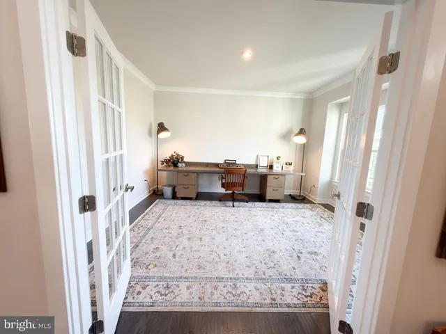 a kitchen with a sink and a stove top oven