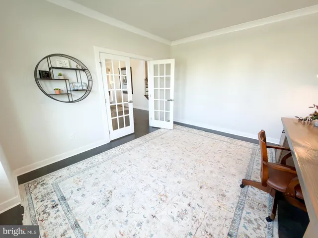 a kitchen with a stove and cabinets