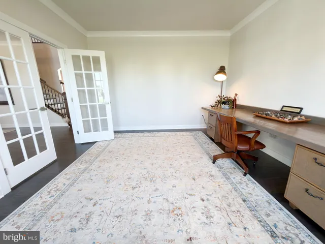 a stove top oven sitting inside of a kitchen