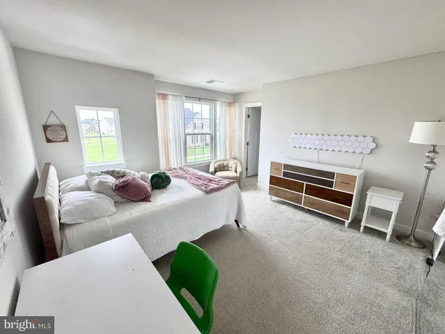 a view of an ocean and houses