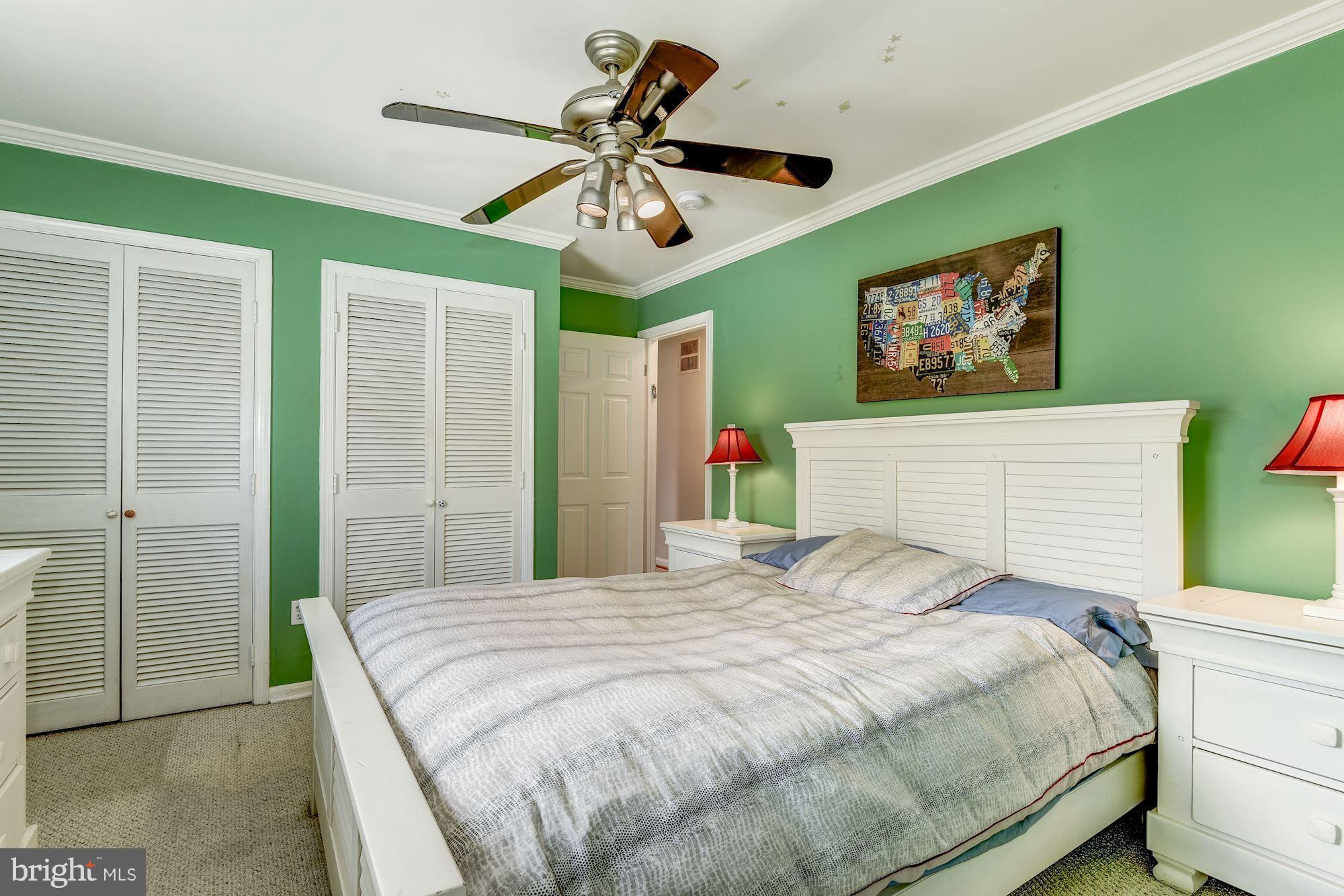 8713 Postoak Road Potomac, MD 20854 - Photo 22 of 30 Third Bedroom has Large Closets + Ceiling Fan