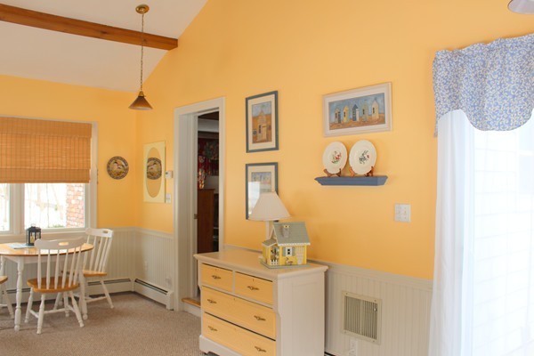 198 Proctor Road Chelmsford, MA 01824 - Photo 6 of 30 a dining room with a table and chairs