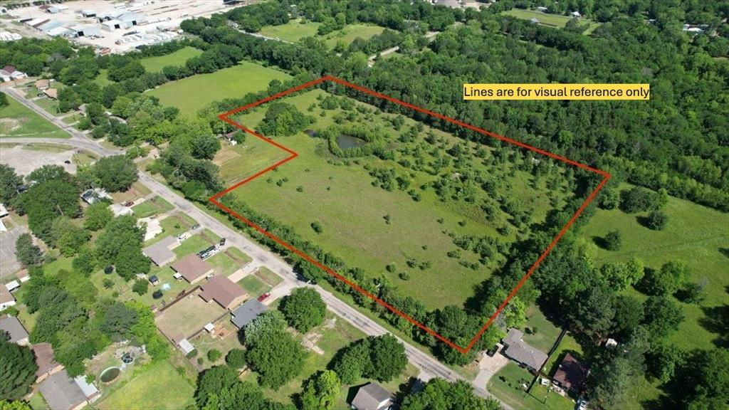 801 Jefferson Road Paris, TX 75460 - Photo 3 of 20 a view of a street with a park