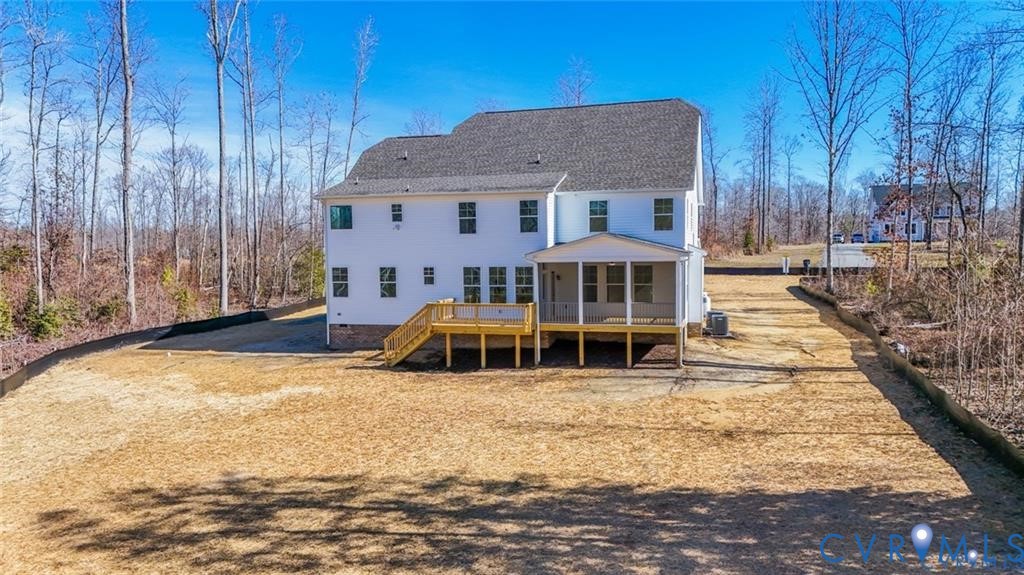 3170 Three Chopt Road Gum Spring, VA 23065 - Photo 11 of 14 a view of a house with a yard